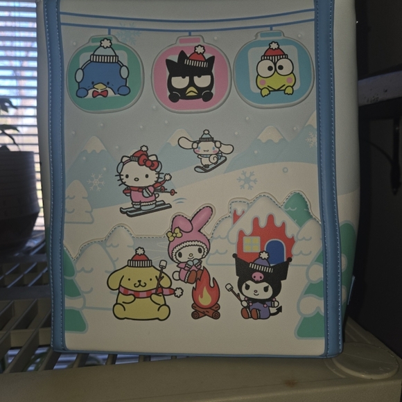 Loungefly Handbags - Loungefly Blue and White Character Backpack